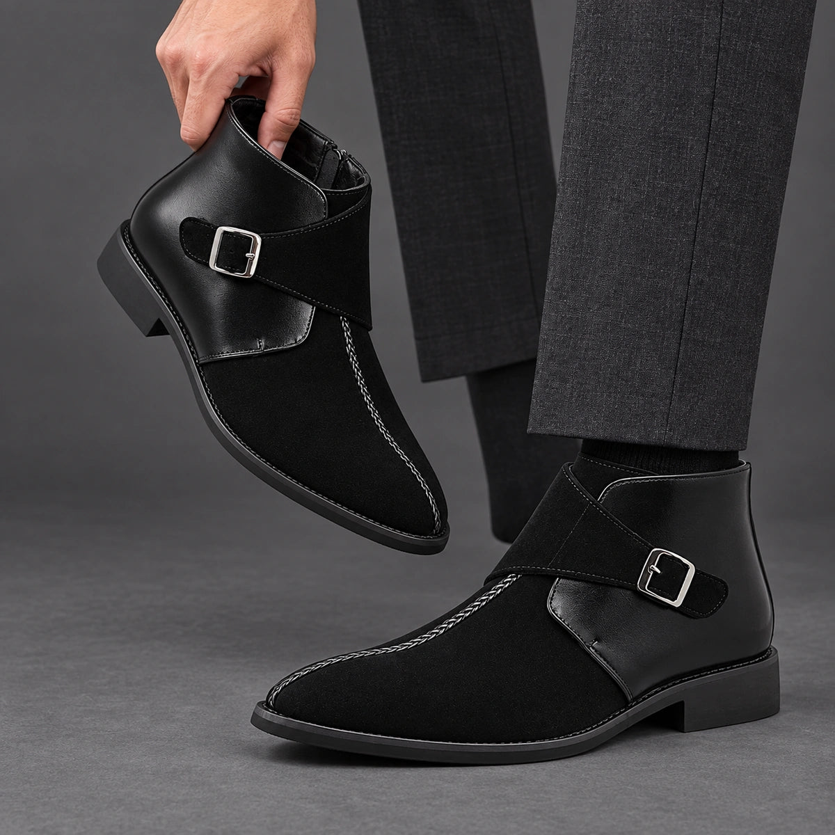 Buckle Ankle Boots | Rocco in Black, one held boot beside matching worn boot