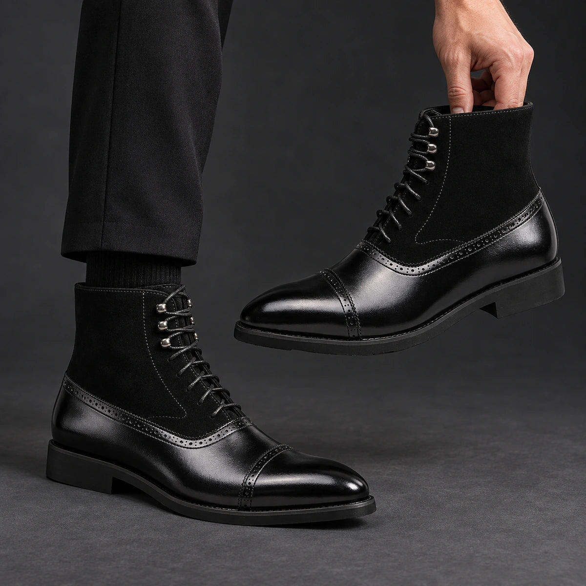 Cap Toe Lace Up Boots | Dario in Black, one boot held beside matching worn boot