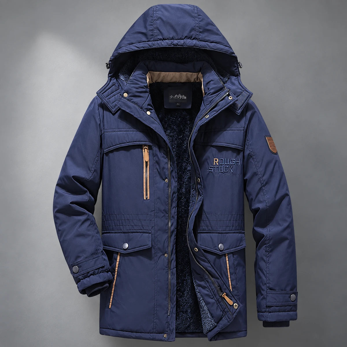 Fleece Parka | Colin Blue front hanging garment against cool gray studio wall