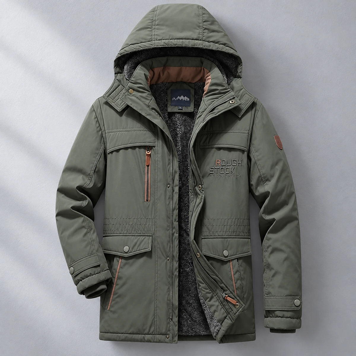 Fleece Parka | Colin Green front hanging garment against cool gray studio wall