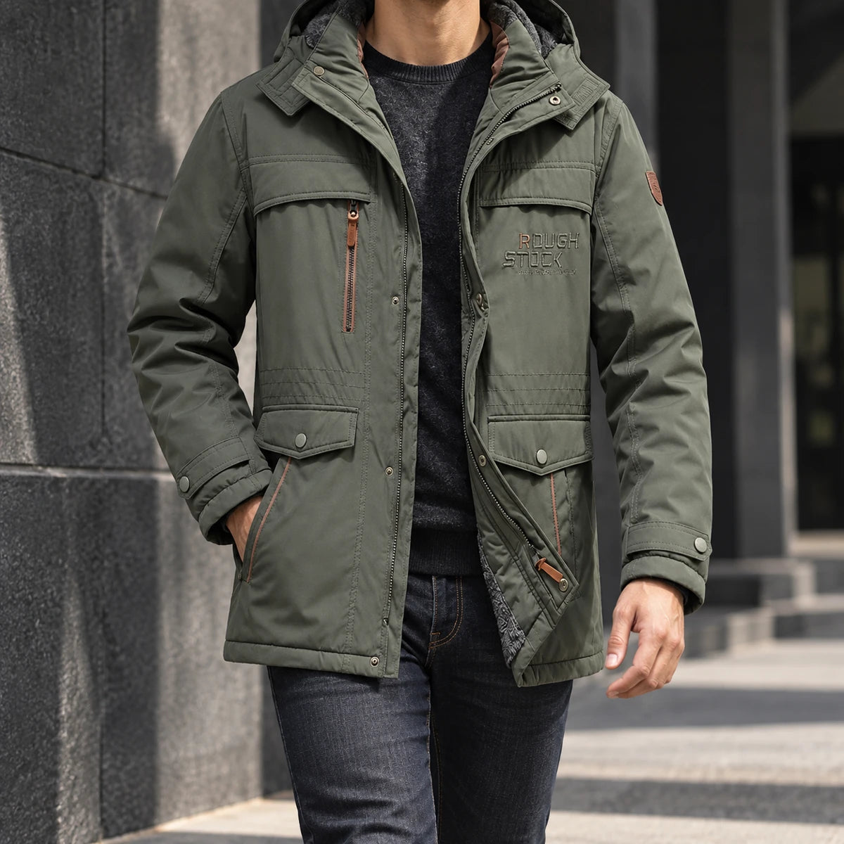Fleece Parka | Colin Green neck-down wearer walking beside dark concrete architecture