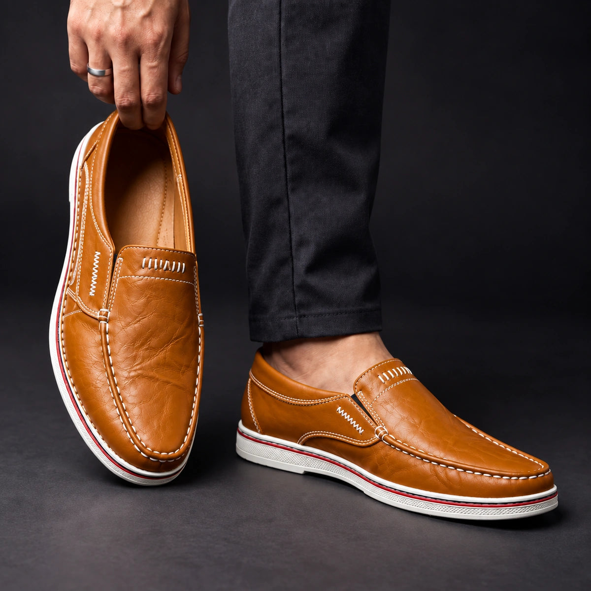 Genuine Leather Loafers Salvatore Brown model holding loafer