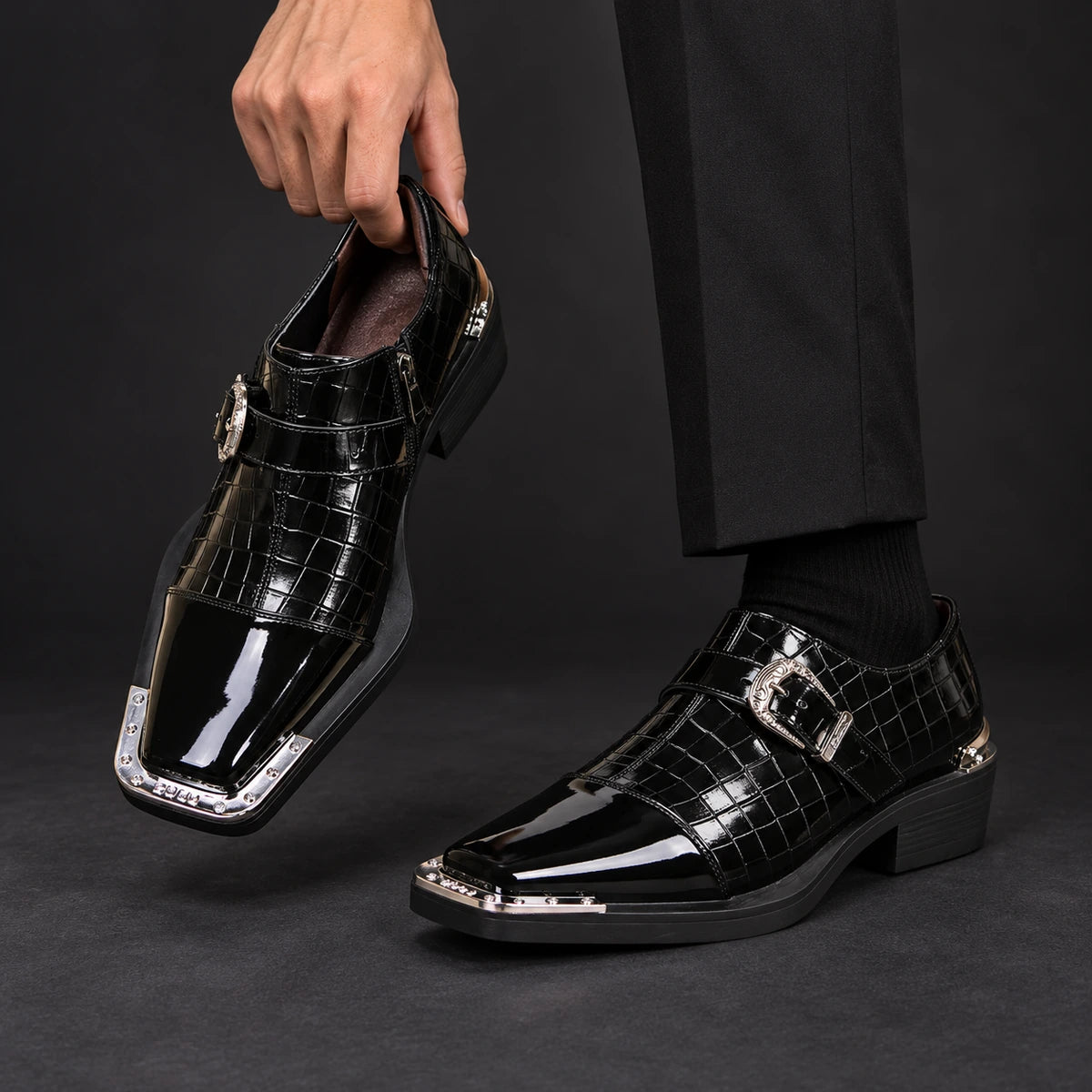 Genuine Leather Shoes | Magnus Black model holding matching footwear