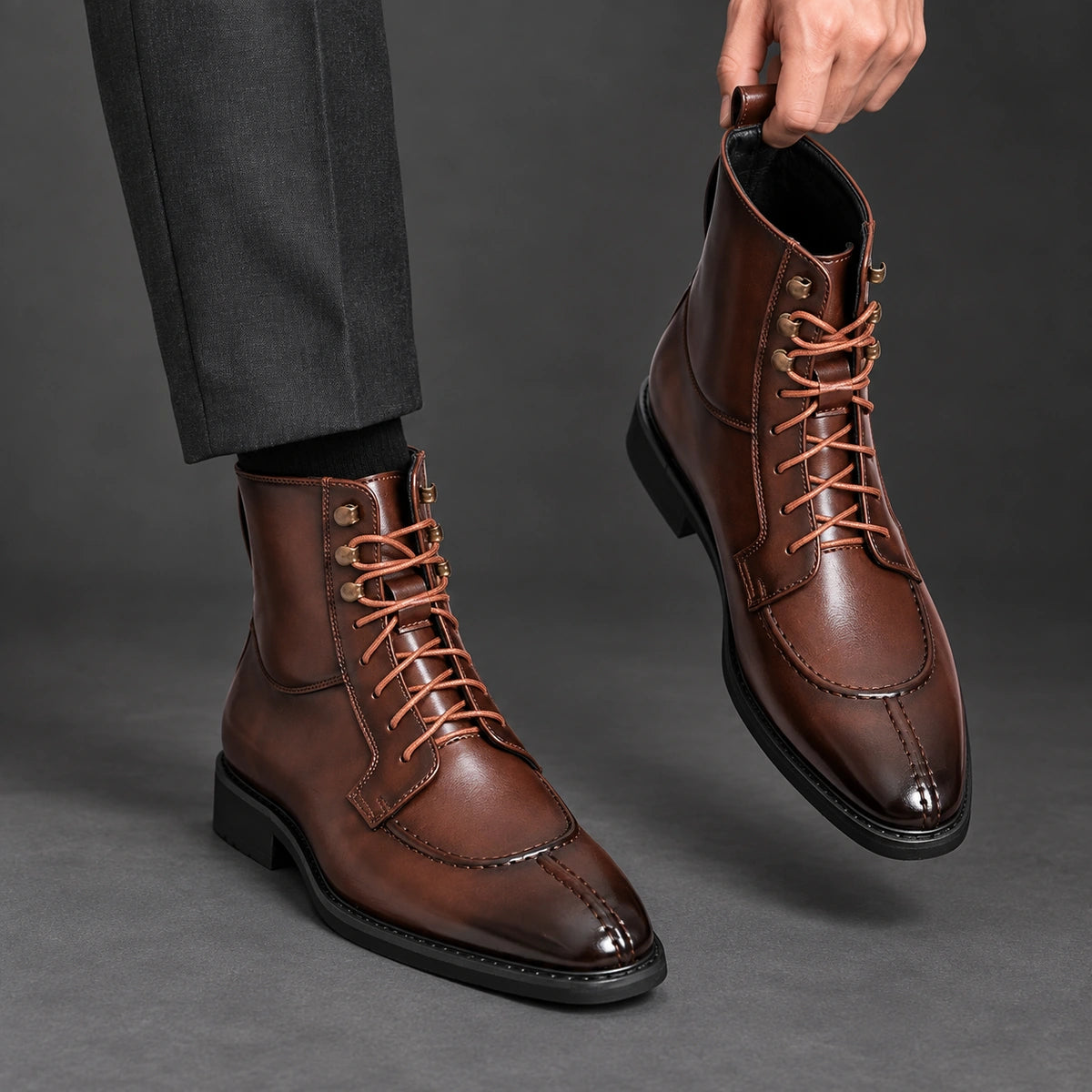 Split Toe Lace Up Boots | Lorenzo in Brown, one boot held beside matching worn boot