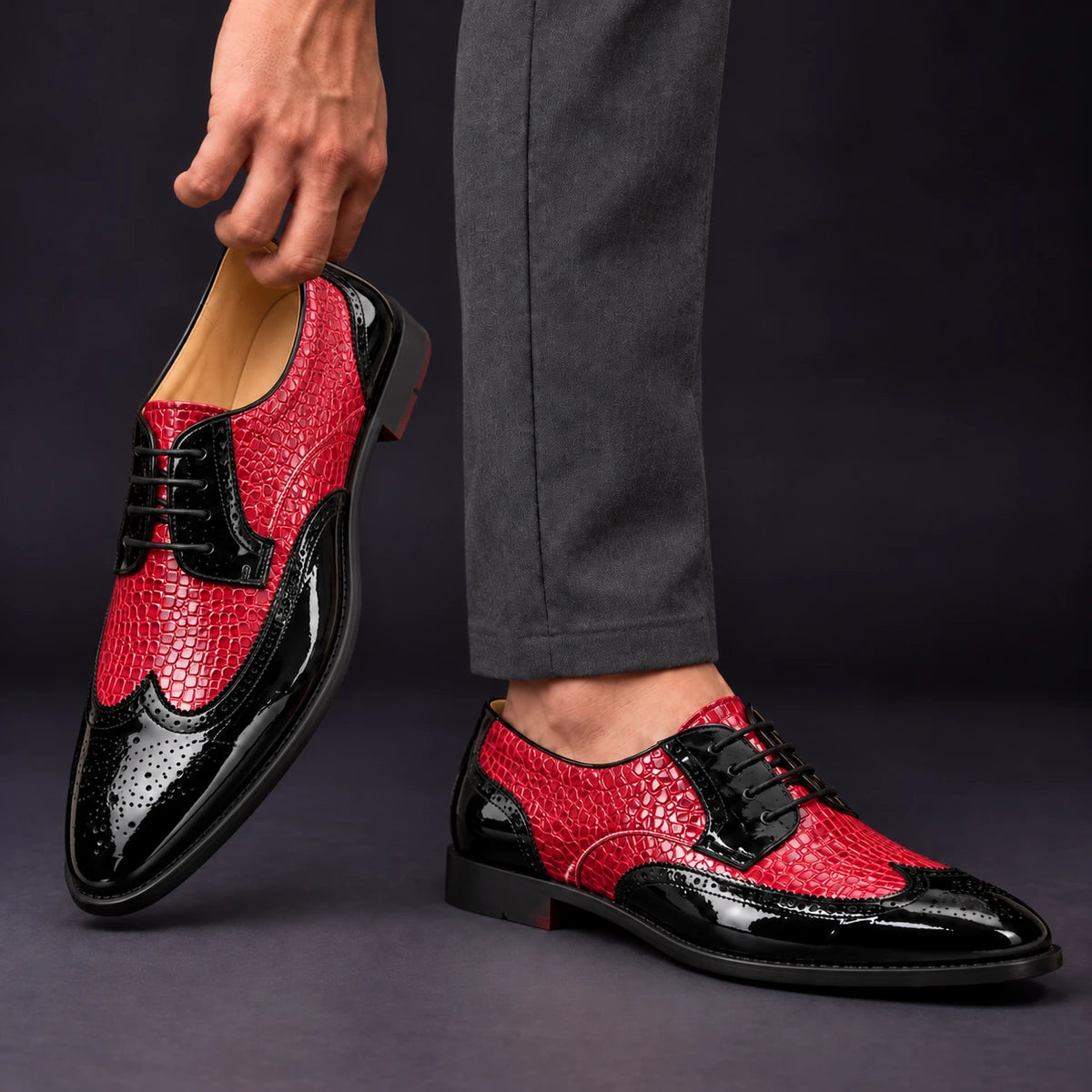 Leather Oxfords | Sven Red model handheld, matching left and right pair