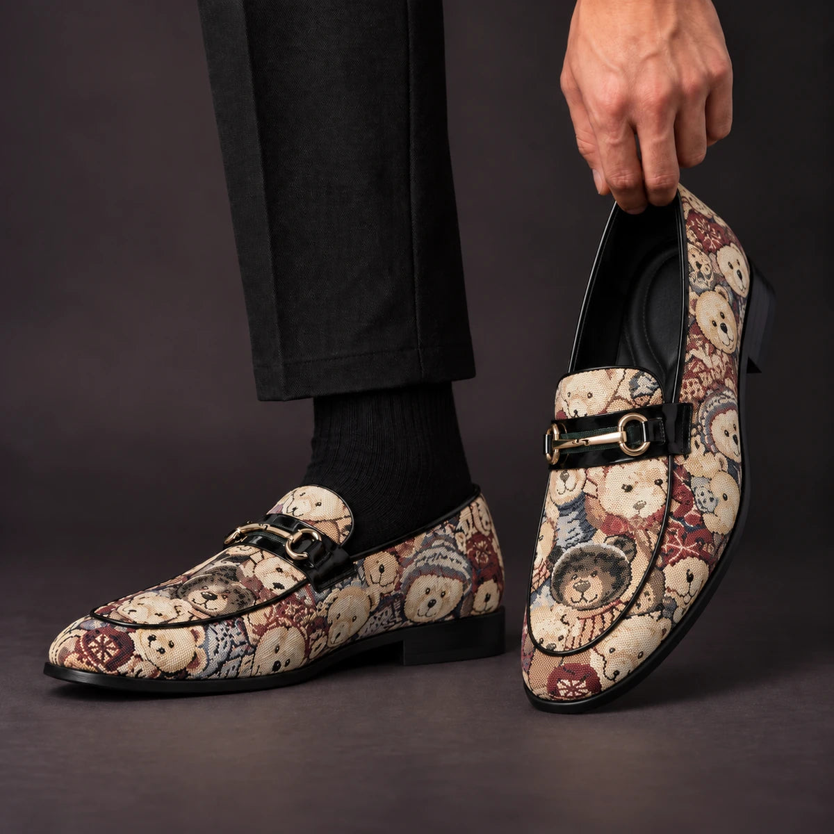 Leather Loafers | Torsten Brown model handheld, matching left and right pair