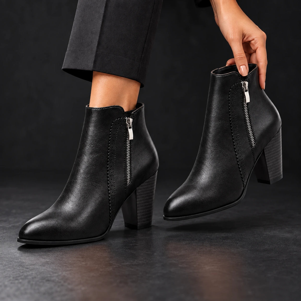Block Heel Ankle Boots Verona Black model holding boot