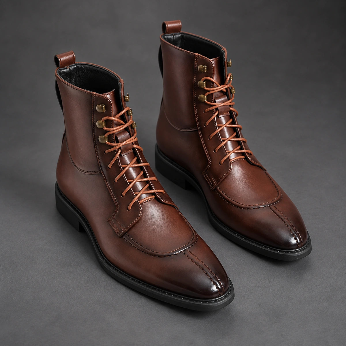 Split Toe Lace Up Boots | Lorenzo in Brown, angled pair studio view