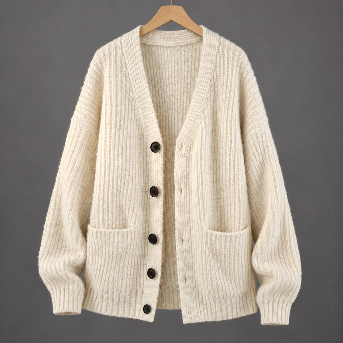 Textured V Neck Cardigan | Ellis in Ivory, front hanging studio view