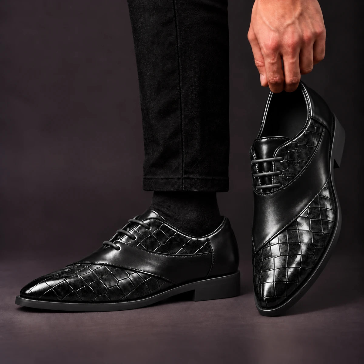 Leather Oxfords | Thibault Black model handheld, matching left and right pair